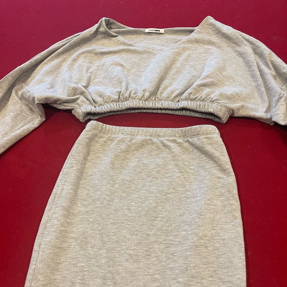 Grey piece set, skirt and sweater.